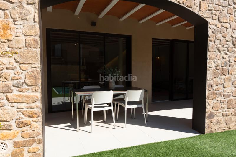 Foto a7f3e2c7-258d-4223-b048-b48761c62f3c. Casa adossada 173m<sup>2</sup> amb xemeneia calefacció aparcament piscina a Pals