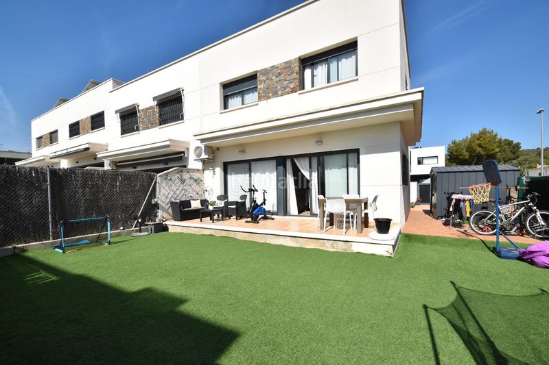 Foto 34ddd157-c65b-4fd2-beb5-0e1b10aa4304. Casa adossada a Cunit residencial Cunit