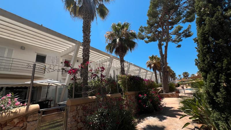 Foto aa7556c8-dcaa-4914-ae96-f0512bf05e6d. Maison jumelée dans Cala d´Or Santanyí