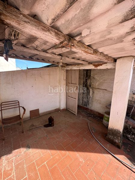 Foto fa2498e3-8ca5-41fb-97a9-188f9b101910. Casa aparellada a Benamargosa