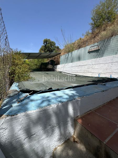 Foto 1211514b-3b86-4d33-bf41-2bfd41f92c7c. Masia amb xemeneia piscina a Benamargosa