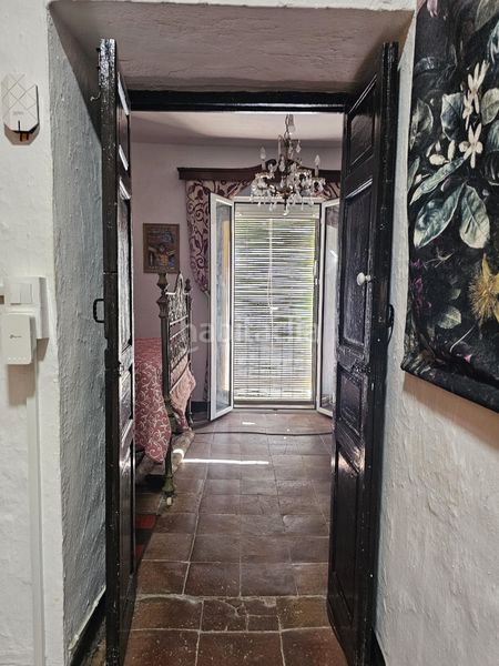 Foto f906f48d-f6be-4f9b-b673-4e0bc14adead. Casa amb xemeneia a Benamocarra