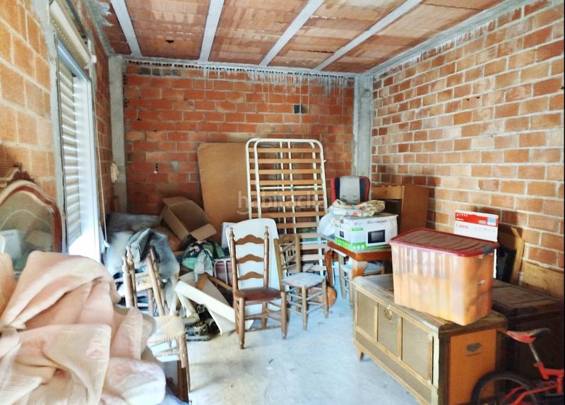 Foto 720c2107-f900-4138-944c-7ed8f3442f2a. Maison avec parking dans Benamocarra