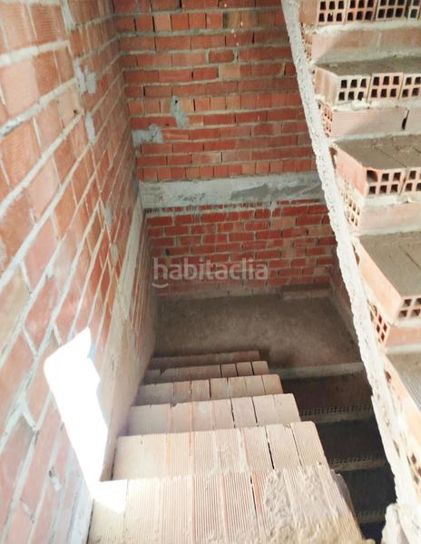 Foto 7ed545db-b1ce-422b-ae5e-8a52932d3968. Maison avec parking dans Benamocarra