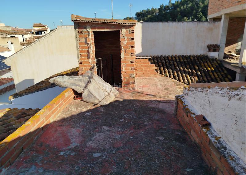 Foto da8ee562-8880-446d-b485-e1bde2055f2c. Maison avec parking dans Benamocarra