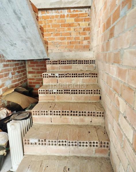 Foto f933f35d-b49b-4260-b59d-720b938a3357. Maison avec parking dans Benamocarra