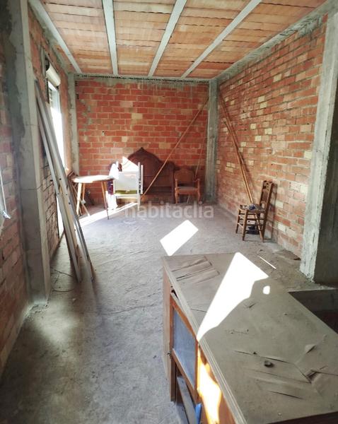 Foto fa1d1732-b27d-4b32-87a1-ec8e9b6f9b6d. Maison avec parking dans Benamocarra