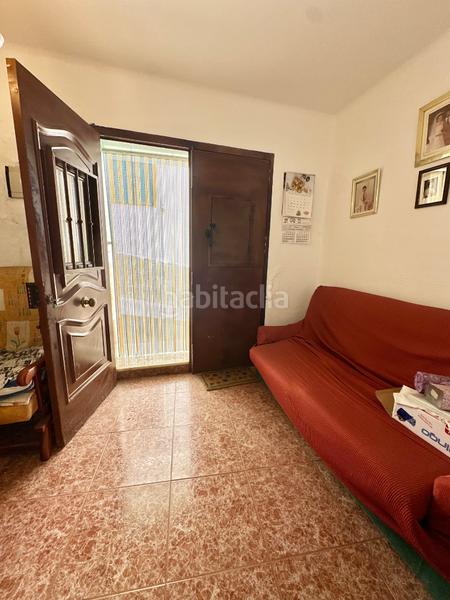 Foto 8a31695d-6081-49d6-93ad-aeab5cd7f140. Casa aparellada a Benamargosa