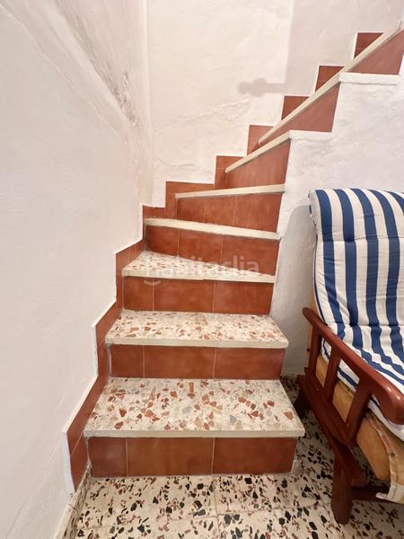 Foto d0ea66c5-bfb8-4a7c-832c-1af653ebe41a. Casa aparellada a Benamargosa