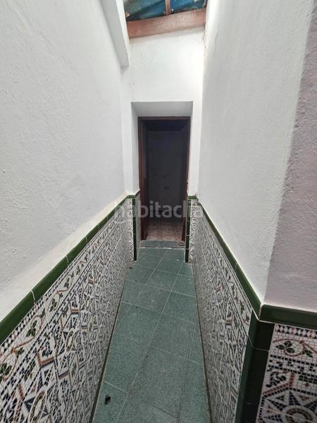 Foto 5d58be07-eeb1-4454-b5ea-f62659d45492. Casa adossada a Benamargosa