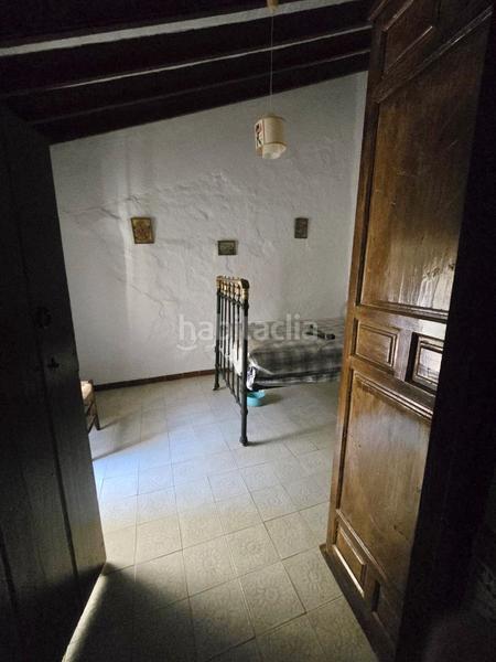 Foto ea5c710c-6c69-49c7-8543-4c7a3b47cca3. Casa adossada a Benamargosa