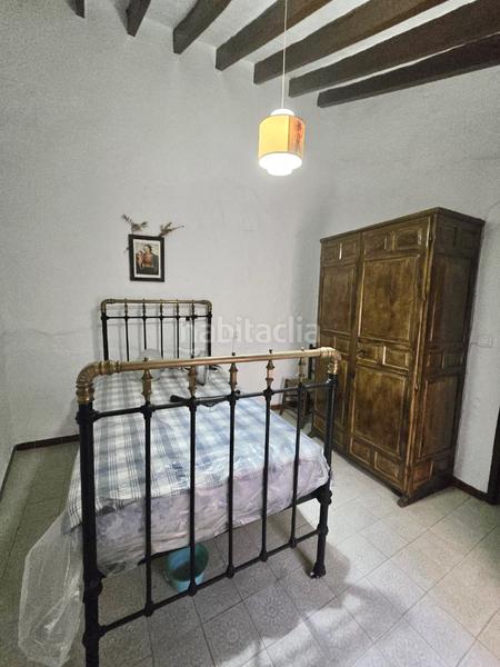 Foto f46e1720-82a2-4d7b-9670-97062f617699. Casa adossada a Benamargosa