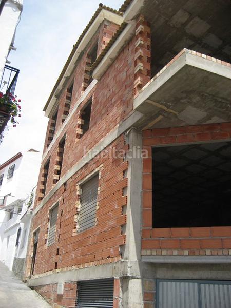 Foto 1bf46dd8-eb81-4260-bf12-d4e2cd4fc43c. Casa adosada adosado en construcción en Benamocarra