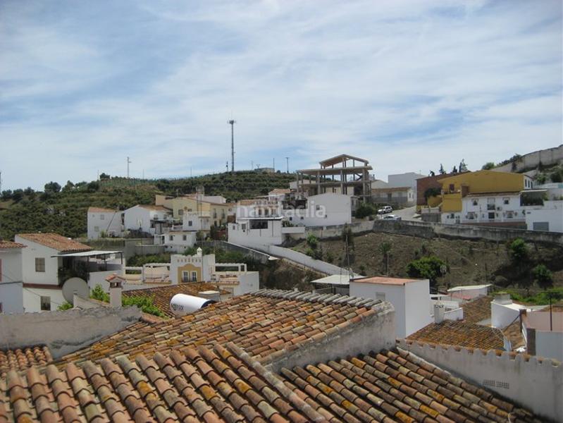 Foto b0f70f9d-b94d-404a-bac1-df03bae6e2ad. Casa adosada adosado en construcción en Benamocarra