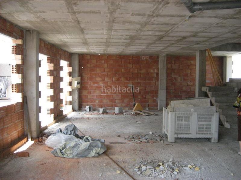 Foto bcea32ac-37ab-46e3-8847-1f3de4a39862. Casa adosada adosado en construcción en Benamocarra