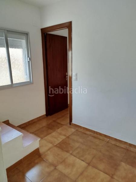 Foto 259e7b85-d4ea-4e73-bc0d-da97a9da610f. Casa adosada en Benamocarra