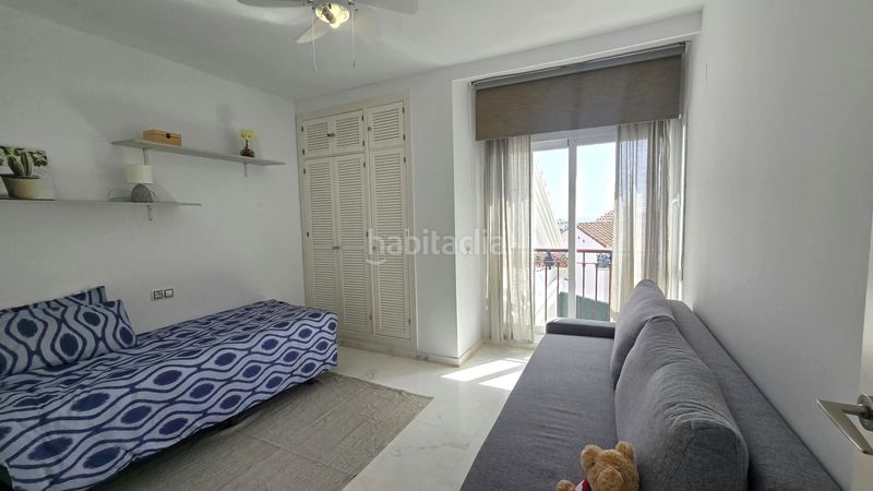 Foto c56174ff-a195-442b-85de-e65fa3d4ce5c. Casa adossada amb calefacció aparcament piscina a Mijas