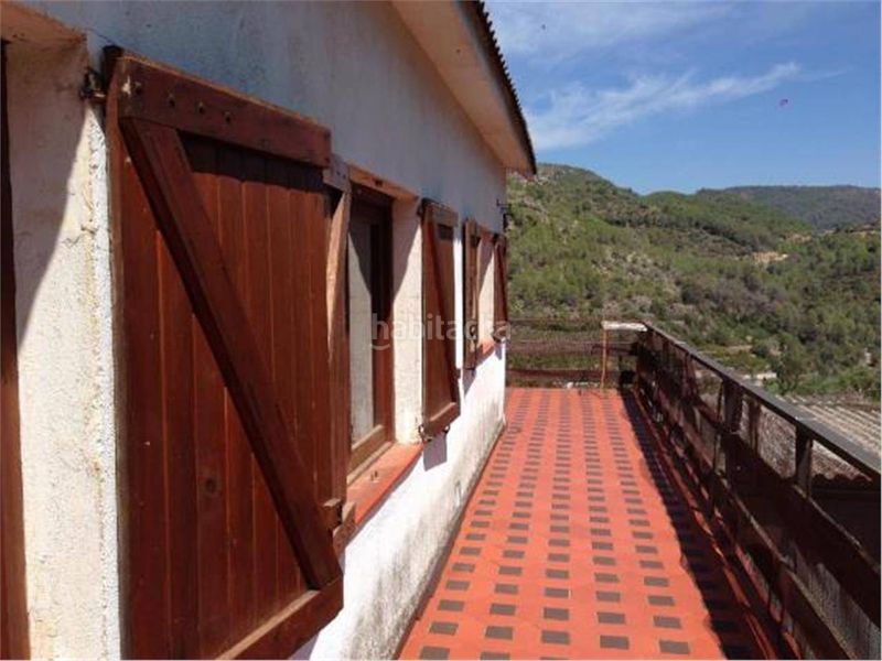 Foto 315684c2-b5fc-481a-a6bc-472b7229881d. Casa a Eslida