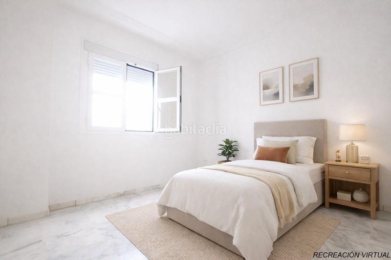 Foto a8af82be-f735-43c6-9cb9-86f25e0fb2ab. Pis amb calefacció aparcament piscina a colores - entreparques Sevilla