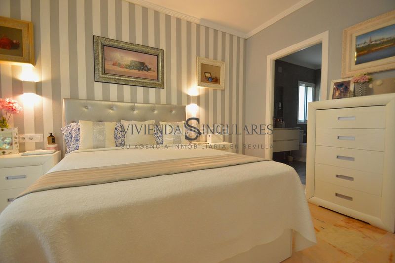 Foto ad94dfb6-ed0a-4663-a83d-b5cc76750ed5. Casa aparellada amb aparcament piscina a Santa Clara Sevilla