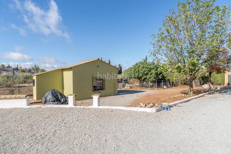 Foto b2bf9e3d-adbd-466a-80f2-9b1f74410144. Xalet amb aparcament a Moraleda de Zafayona