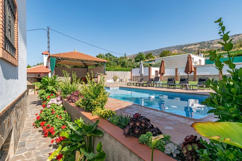 Foto caffe2f0-fc4f-4235-94e8-a154d128ccf0. Xalet amb aparcament piscina a Órgiva
