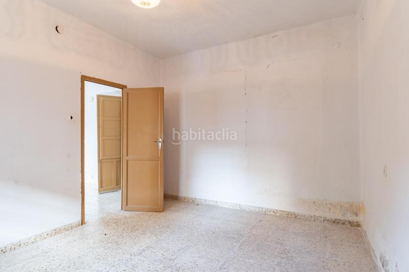 Foto 429f121d-347a-4ca7-b5f6-c8d4c4b8bd32. Casa adosada casa centrica para reformar en Albolote