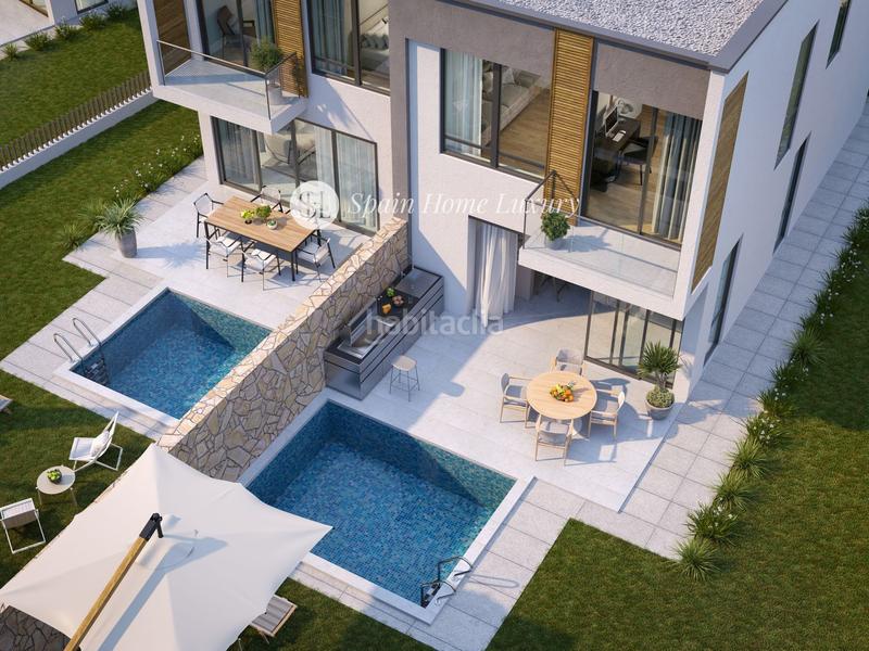 Foto de49eb08-50f9-45a1-bed2-6e391b30904b. Doppelhaus mit parking pool in Pueblo Eliana (l´)