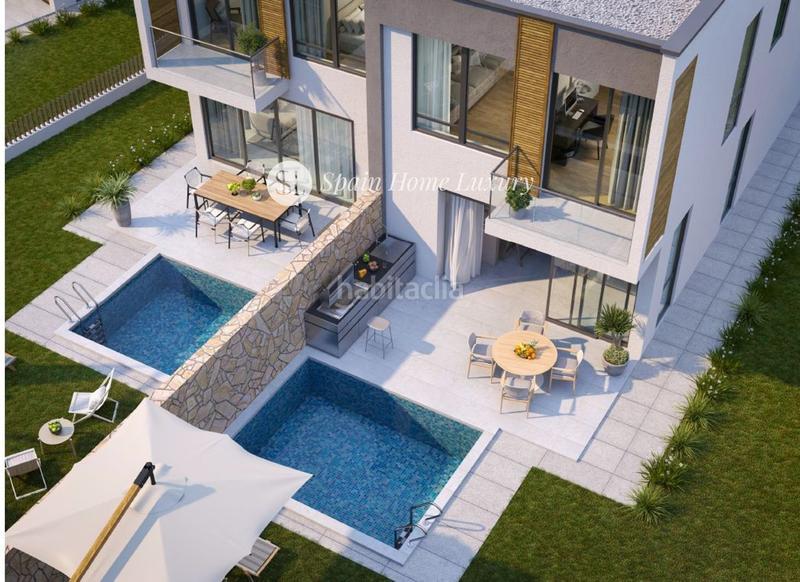 Foto 83aa253d-3330-4d92-a007-675e424f2a6a. Casa adossada amb piscina a San Antonio de Benagéber