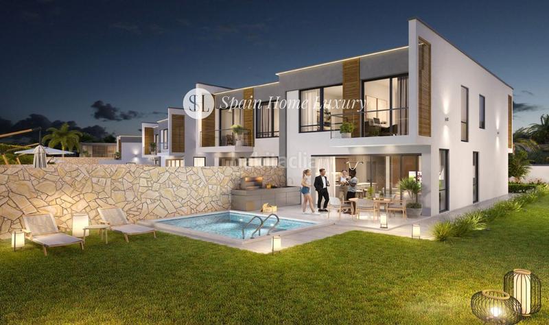 Foto 8c64ddc1-5ef8-4f2a-b530-d14474631fde. Casa adossada amb piscina a San Antonio de Benagéber