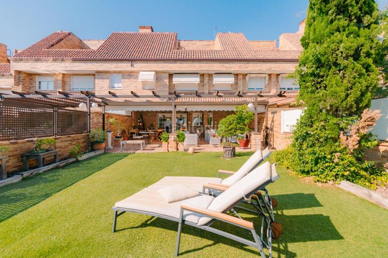 Foto 7126c7c3-b86b-4151-91b3-67b8b663dc16. Casa adossada amb calefacció aparcament piscina a Rozas de Madrid (Las)