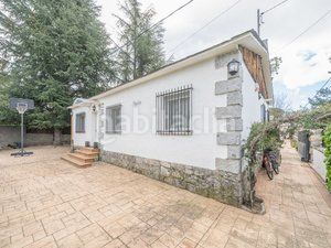 Foto 0c1dd2d3-df47-4b7c-94d9-ee27f16a9bce. Casa amb calefacció aparcament piscina a Polideportivo-Colonia Moralzarzal