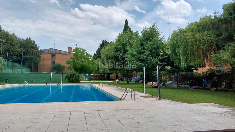 Foto 94bafdf2-ffd0-4940-833e-b28a8dcec21e. Pis amb xemeneia calefacció aparcament piscina a Collado Mediano