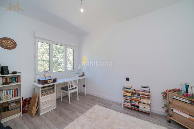 Foto 58d339b2-8f9c-4316-881e-d3cf38b0ae55. Casa aparellada amb calefacció aparcament piscina a Collado Mediano