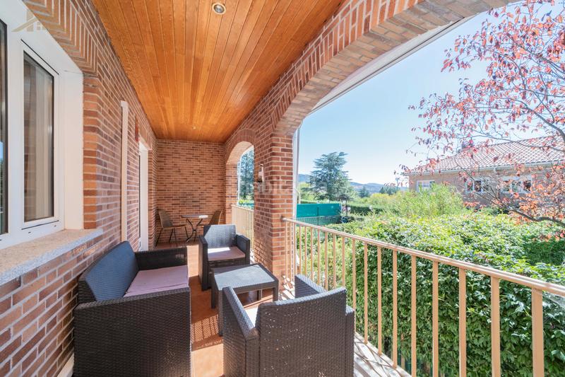 Foto 71d93651-373b-4bdd-8449-c10eb083c0ec. Casa aparellada amb calefacció aparcament piscina a Collado Mediano