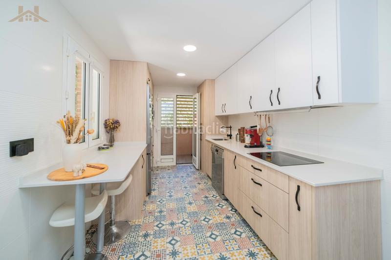 Foto d2f7b299-d344-4f96-876e-4fc7d54d42ac. Casa aparellada amb calefacció aparcament piscina a Collado Mediano