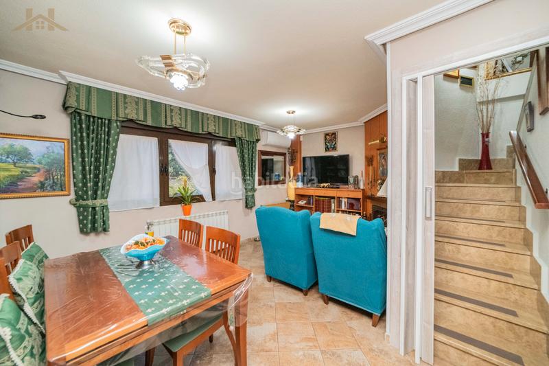 Foto c5d1f599-98a8-4949-9896-7d24df83e36f. Casa adossada amb xemeneia calefacció piscina a Centro Moralzarzal