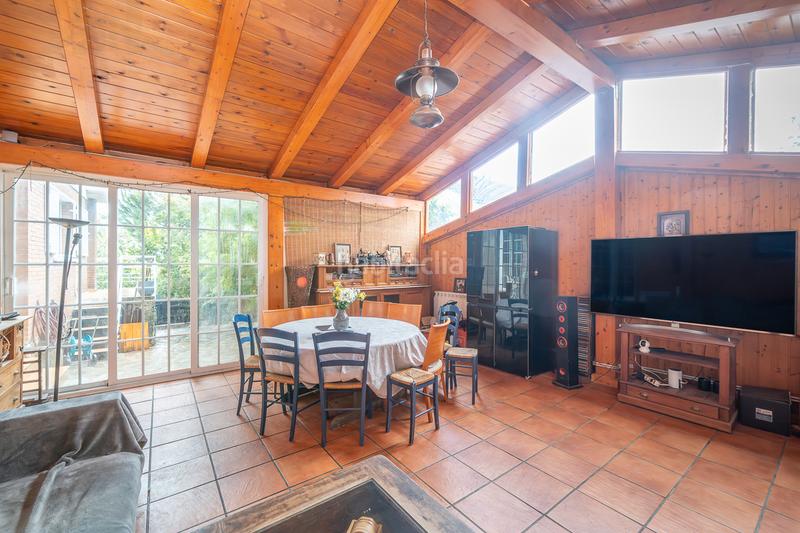 Foto 03bcb40a-6135-455b-9e89-57d800a374b6. Casa aparellada amb xemeneia calefacció piscina a Moralzarzal