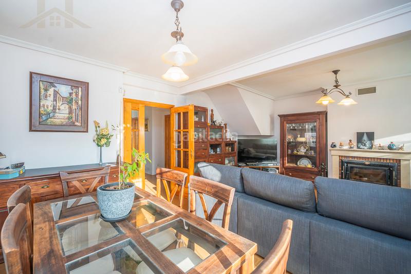 Foto 0b55e034-ca2c-405d-8750-c35a478348cb. Casa aparellada amb xemeneia calefacció piscina a Moralzarzal