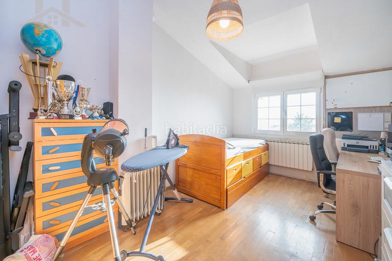 Foto 3243a499-8872-47b4-a9d6-789e7a2e350f. Casa aparellada amb xemeneia calefacció piscina a Moralzarzal