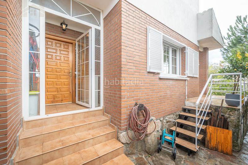 Foto 4aaefc90-bceb-4df1-9df3-8e2ba29c9585. Casa aparellada amb xemeneia calefacció piscina a Moralzarzal