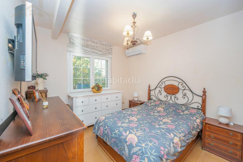 Foto cf4a3911-cdd3-4d66-94b7-e10a6f29fe79. Casa aparellada amb xemeneia calefacció piscina a Moralzarzal