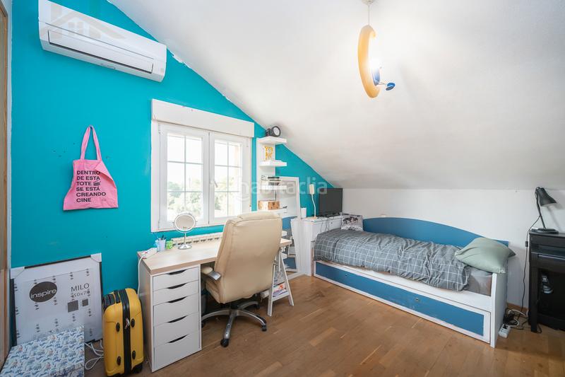 Foto e14d506e-5b67-4ba3-aca4-9d6066963996. Casa aparellada amb xemeneia calefacció piscina a Moralzarzal