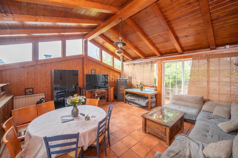 Foto ee1d1055-0db5-4ba9-aeb8-39d5a9490001. Casa aparellada amb xemeneia calefacció piscina a Moralzarzal