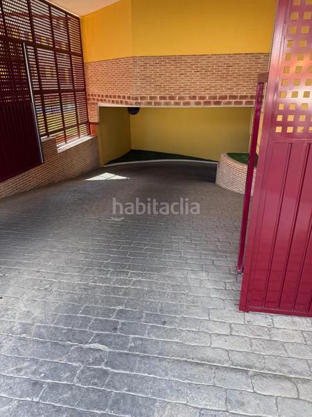 Foto ec017a6d-4b41-48e3-b3a9-62008f6569af. Car parking in Magán