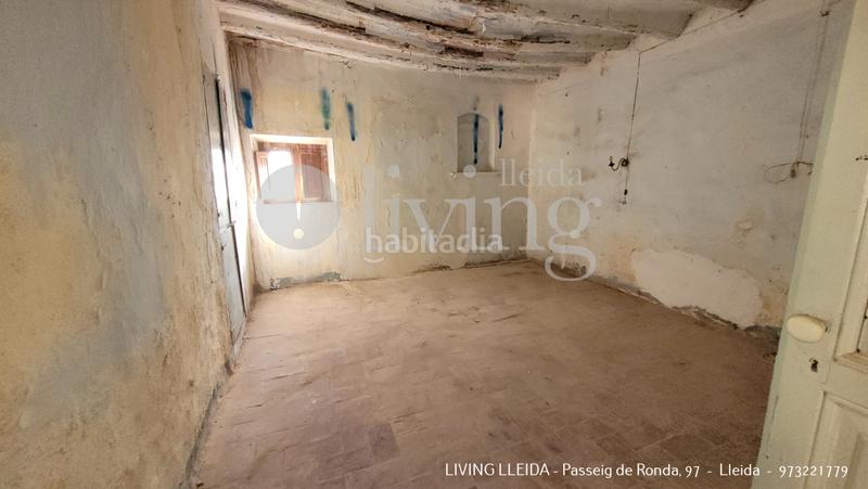 Foto 96f816cd-1a0f-4258-a642-45bf2f291394. Casa amb aparcament a Sarroca de Lleida