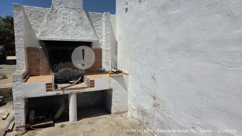 Foto 8a1f1b3c-d601-4a13-9a35-1a2bbc3f8eec. Casa amb xemeneia piscina a Puigverd de Lleida