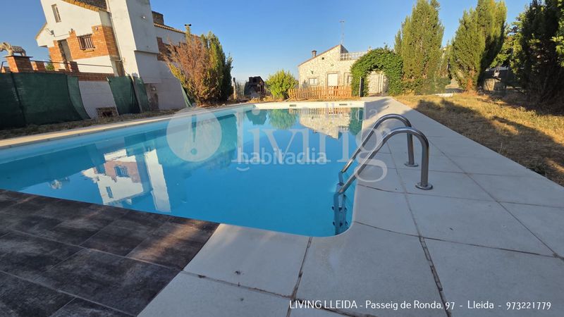Foto 06fa37e0-5a97-463b-a3b4-3a8aa1accb70. Casa amb xemeneia calefacció piscina a Partides Rurals Lleida