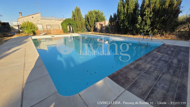 Foto c74d6bcd-9754-43fa-8cc8-33eded224e95. Casa amb xemeneia calefacció piscina a Partides Rurals Lleida