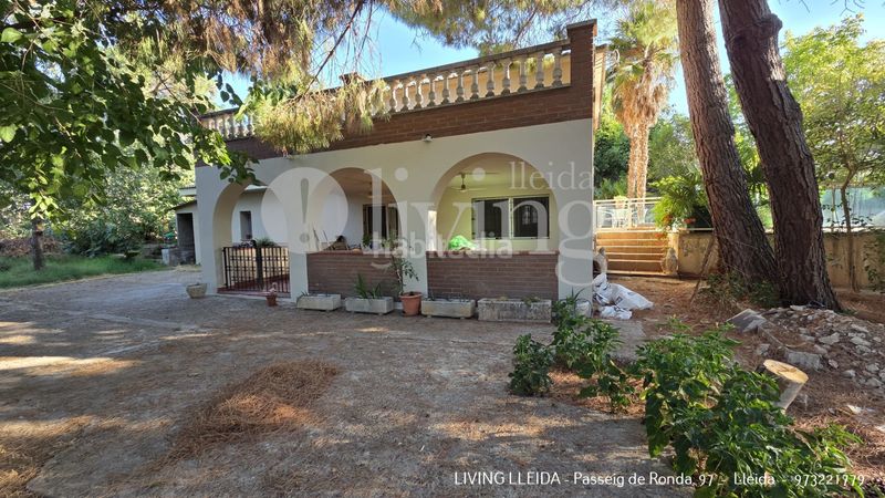 Foto a53a5825-cc7a-41fe-84b1-15e9c7587c84. Casa amb xemeneia calefacció aparcament piscina a Lleida